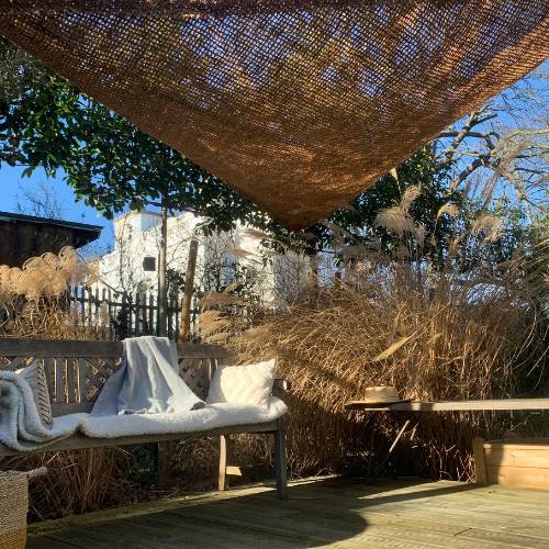 Toile ombrage triangulaire en fibre de coco triangulaire pour terrasse bohème